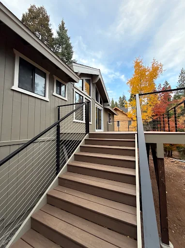Finished home exterior and deck with crisp coordinated colors
