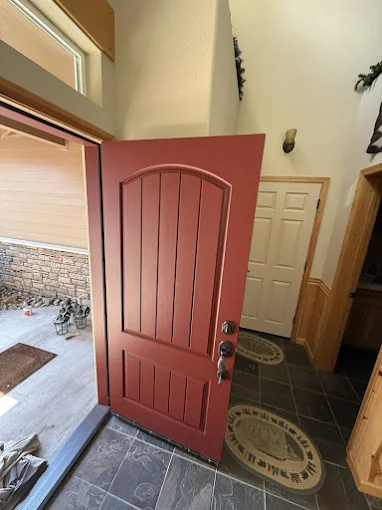 Freshly finished red front entry door
